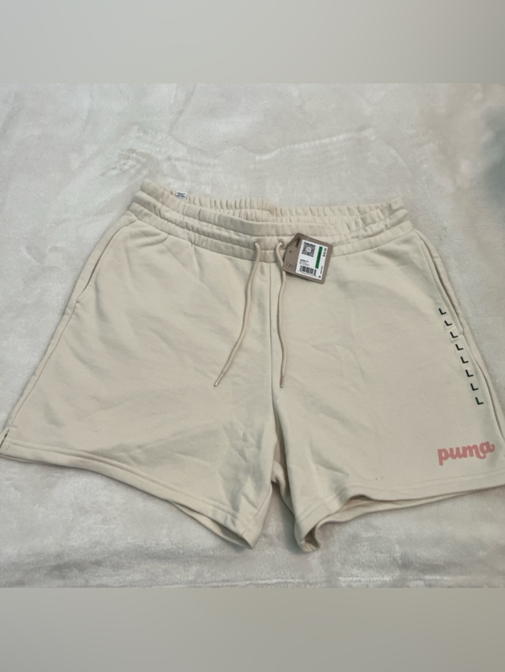 Puma Women's Cream Athletic Drawstring Shorts with Pink Logo